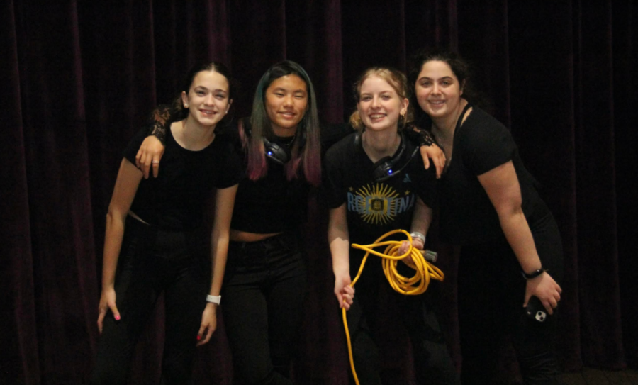 Stage crew members Kara Mobyed, Kate Rusin, Norah Corrigan, and Samantha Dorne backstage preparing to amaze the crowd of Fall play, The Play That Goes Wrong.