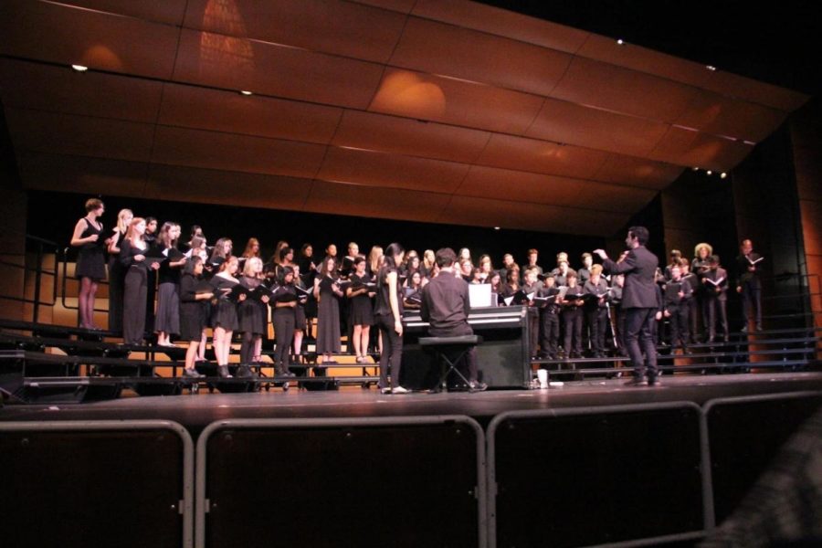 Mr. M conducts the high school’s choir program during the Fall Choir Performance.