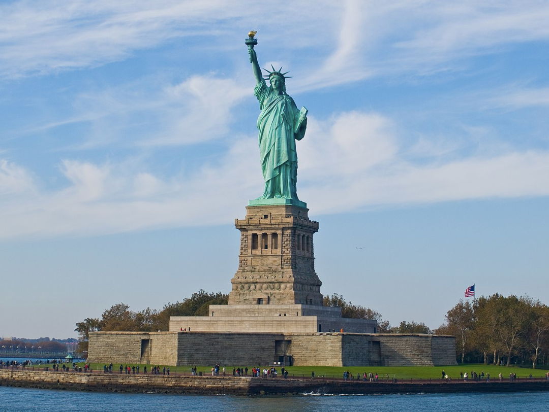 %E2%80%9CThe+New+Colossus%2C%E2%80%9D+Emma+Lazarus%E2%80%99s+famous+1883+poem+welcoming+immigrants+to+America%2C+is+inscribed+in+the+Statue+of+Liberty+%0A